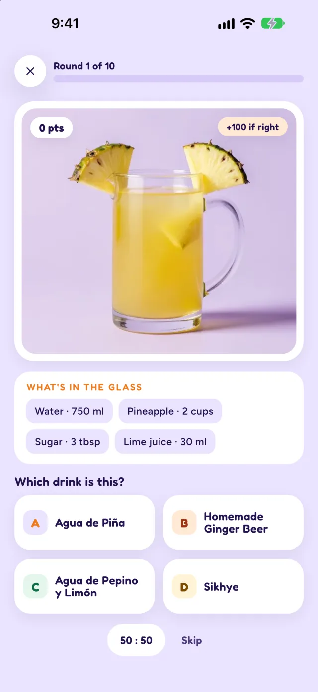 Name that drink, round 1 of 10: a photo of a yellow drink in a jug with pineapple, what's in the glass, and four answers to choose from